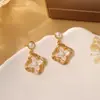 Pendientes de Trébol de Cuatro Hojas con Goteo de Aceite de Gama Alta, Lujo Accesible, Pendientes de Moda y Versátiles, Pendientes de Plata de Ley S925 con Diseño de Nicho al por Mayor