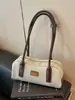 Bolsa de textura luxo leve feminina 2026 verão nova tendência bolsa de ombro único transversal bolsa de mão retro Boston bolsa feminina fashion