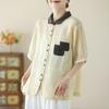 Foto Real da Camisa Artística Estampada de Algodão e Linho Novo Estilo 2026, Novo Modelo de Verão com Gola Reversível, Bolsos Canguru, Camisa de Manga Curta