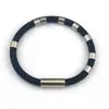 Pulsera de Silicona Antiestática de Venta Caliente Transfronteriza de Invierno con Cierre Magnético de Acero Inoxidable, Accesorio de Muñeca Deportiva de Ocho Anillos para Parejas, Venta al por Mayor