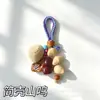 Paquete de Materiales DIY para Carrillón de Conchas de Fruta Estilo Bosque Semillas de Conchas de Fruta Tejidas Colgante para Mochila Adorno Puesto de Lugar Escénico Regalo Venta al por Mayor