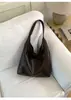 Bolsa para Comercio Electrónico Transfronterizo Fábrica de Origen Estilo Universitario Retro Lo Más Nuevo 2026 Bolso Tote Melanoidio de Hombro Único