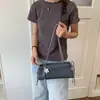 Bolso tipo baguette de lona a rayas estilo coreano para mujer, diseño de nicho con colgante de estrella, bolso de hombro versátil simple vintage