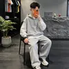 Conjunto de moletom infantil 2026 novo primavera e outono grande vestuário esportivo infantil colete com capuz conjunto de três peças para meninos moda casual