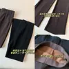 Pantalones acampanados cropped de cintura alta nuevos para otoño para mujer, con diseño de pliegues verticales elásticos compuestos de doble capa para alargar las piernas