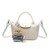 Bolso de hombro tejido nuevo, casual, simple y elegante de otoño, bolso tipo cubo de moda, bolso cruzado para mujer estilo coreano