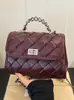 Bolso de mujer transfronterizo 2026 primavera-verano nuevo estilo bolso de mano pequeño inspirado en Chanel, moderno bolso de hombro y bandolera con cadena acolchada