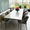 Mesa y silla de exterior nórdicas, modelo comercial de silla de ratán para calle, casa, villa, exterior, exterior, combinación, patio, cuerda, balcón, mesa y silla
