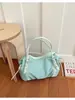Bolso de axila vintage de alta gama para mujer, nuevo modelo 2026, bolso de nicho para el día a día, bolso de mano moderno versátil y elegante, bolso tipo almohada
