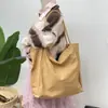 Bolsa de Lona Cor Sólida Feminina Grande Capacidade Estilo Coreano Estilo Preguiçoso Bolsa de Ombro Transfronteiriça Explosão Bolsa de Água Lavada em estoque Atacado