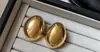 Pendientes Metálicos Grandes Exagerados Únicos de Oro y Plata Personalizados para Mujer 2026 Nuevo Estilo Caliente Sentido de Alta Gama Pendientes de Botón de Lujo Ligero Joyería para Orejas