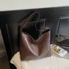 Shuai Mi Jia Bolsa Tote Retrô de Grande Capacidade Moda Tendência Estilo Coreano 2026 Outono Nova Bolsa de Ombro Transversal de Nicho