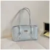 Bolsa estampada elegante de alta qualidade para mulheres 2026 nova moda para o dia a dia bolsa de ombro única bolsa de axila bolsa tote versátil para carregar na mão
