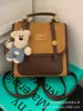 Mochila para Estudante Universitário e Deslocamento Feminina 2025 Nova Alta Qualidade Retro Camurça Bolsa Escolar Mochila de Viagem Leve