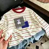 Camiseta de manga larga a rayas de retazos de algodón puro para niños, nuevo estilo primavera y otoño, camiseta básica elegante y holgada para niños