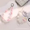 Nueva cadena para teléfono Barbie en negro y rosa, accesorio de teléfono dopamina dulce y picante, joyería de cadena con colgante de cuentas estilo ins