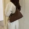 Bolso vintage de gran capacidad transfronterizo para mujer, nuevo bolso cruzado casual versátil de otoño 2026, bolso de hombro de lona para debajo del brazo