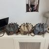 2025 Moda Coreana Textura de Moda Nuevo Otoño Simple Gran Capacidad Casual Cubo Hombro Cruzado Axila Bolso para Mujer
