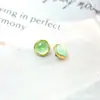 Brincos de Pino Liga de Titânio F-136 Borda Ondulada Dourada Sentido de Luz Pedra Olho de Gato Titânio G23 Rosca Interna Piercing para Lábio com Zircônia