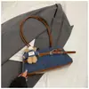 Bolsa Tote Retrô de Luxo para Mulheres 2025 Nova Moda Design Simples Elegante Versátil Bolsa de Ombro Transversal