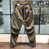 Pantalones casuales de trabajo de marca de moda para otoño e invierno con forro polar para hombre, cintura elástica con cordón, holgados, estilo Harlan de moda INS