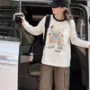 Ropa interior para niñas Otoño Manga larga 2026 Nueva camiseta Niños Estilo coreano Holgada Mediana y Grande Moda infantil Top de dibujos animados