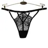 Ropa interior sexy hueca transpirable de cintura baja para mujer europea y americana color sólido encaje divertido una con tanga