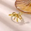 Anillo abierto de serpiente con lazo microincrustado de circonita, de lujo ligero europeo y americano, elegante y versátil, en stock para venta al por mayor