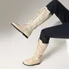 Botas versátiles de caña alta para mujer para uso transfronterizo, punta redonda, suela de goma, antideslizantes, cremallera lateral, color liso, tacón bajo, ligeras, talla grande, botas Martin