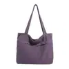 Bolso de lona lavado estilo japonés transfronterizo nuevo, gran capacidad, diseño simple, adecuado para ir al trabajo y se puede usar como bolsa de compras para estudiantes