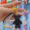 Net vermelho diamante violento urso carro controle remoto corrente anel cordão chaveiro pingente personalidade casal saco pendurado atacado