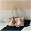 Bolsa tote de color sólido, estilo retro, gran capacidad, nueva colección 2026, moderna, simple y elegante, adecuada para el trabajo y los desplazamientos, bolso de hombro