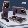Adecuada para Huawei Mate XT2, esta funda de teléfono ultradelgada cuenta con un soporte giratorio de 270 grados y un elegante borde dorado.