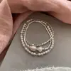 Pulsera de huevo de paloma con cuentas azules estilo vacación en isla, pulsera de doble capa con borla de perla, moda de lujo ligero, temperamento de alta gama