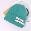 Gorro de Tricô com Fivela de Couro Estilo Americano para Homens e Mulheres, Comércio Transfronteiriço Outono e Inverno, Chapéu de Lã Versátil Emagrecedor, Chapéu Quente e à Prova de Frio