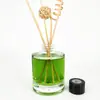 Suministro puntual botella de aromaterapia 100ml botella de vidrio para aromaterapia botella de aromaterapia con flor seca botella volátil de ratán botella cilíndrica