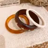 Pulsera redonda de resina geométrica irregular y cuentas de madera, juego de tres piezas, muñequera simple y elegante para el día a día, accesorio de mano versátil
