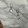 Aretes de Cristal Irregular Transparentes de Alta Calidad Acentos de Diamante Frescos Rombo Gota de Agua Lujo Ligero Sencillo Versátil Realza el Temperamento Para el Trabajo