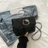 Bolso de mano de nicho de Hello Kitty, bolso pequeño cuadrado cruzado, bolso de mujer de alta gama, bolso de cadena versátil para el verano