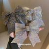 Horquilla con resorte y lazo de diamantes de imitación de súper hada, diseño japonés y coreano, horquilla para el pelo recogido, accesorio para el cabello de nicho para mujeres.