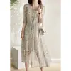 Vestido longo floral, vestido francês de manga curta, design único, novo vestido de comprimento médio para mulheres do verão de 2026