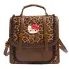 Mochila nicho fresco caricatura 2026 mochila para ir al trabajo nuevo estilo femenina lindo estilo pequeño versión coreana escolar estampado de leopardo moda