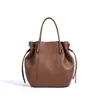 Bolso tipo cubo elegante 2026 para el trabajo, bolso cruzado para la ciudad para mujer, bolso casual simple para mujer, bolso de mano con nuevo diseño de nicho