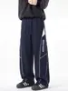 Pantalones rectos de punto gofrado con costuras de contraste para hombre ACU, nuevos pantalones anchos casuales de tendencia de marca para otoño/invierno 2026, pantalones curvos