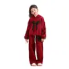 Traje de Ano Novo para Meninas 2025 Novo Suéter Vermelho com Laço e Calça de Moletom Esportiva Conjunto de Duas Peças Roupas de Ano Novo