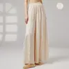 Disfraz de danza clásica, etéreo y elegante, con un top de malla transparente de bajo asimétrico y fluido, adecuado para actuaciones y práctica