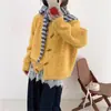 Cardigã Tricotado de Gola Redonda Estilo Suave com Botões de Chifre para Mulheres 2025 Outono e Inverno Novo Solto Macio Encerado Versátil Jaqueta Suéter
