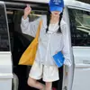 Jaqueta Fina de Proteção Solar para Meninas Verão 2026 Novo Estilo Infantil Solta Estilo Coreano Com Capuz Listrada Casaco Leve para Crianças Maiores