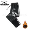 Pantalones de chándal gruesos y cálidos con forro de forro polar, nuevos para invierno, unisex, con tres rayas, pierna recta, puños, moda casual, joggers