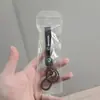 Venta al por mayor de llaveros populares para coche y llaveros de alta gama para motocicleta, perfectos como accesorios decorativos y pequeños regalos para exportación